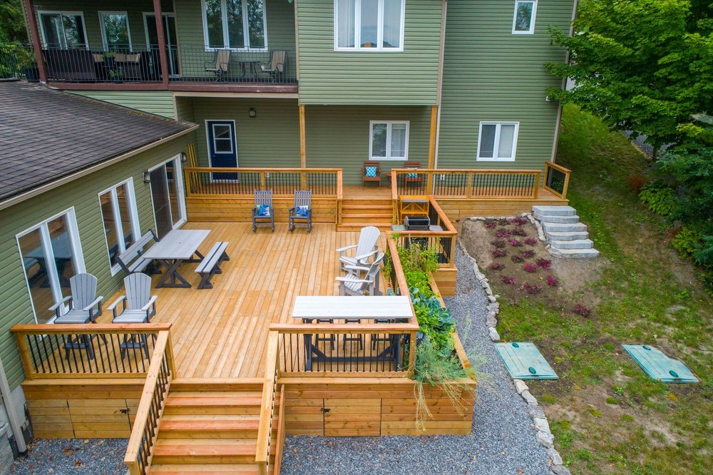 Wood deck surrounded by a garden